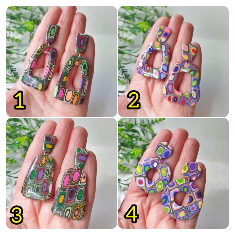 May include: Four pairs of dangle earrings featuring multi-colored, layered geometric patterns. Pair 1 has trapezoidal shapes, pair 2 has rounded rectangular frames, pair 3 has solid-looking trapezoids, and pair 4 has circular designs with center cutouts.