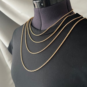 Stamp on gold chain 2025