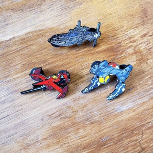 Set of Red Tail, Swordfish II, and Jett’s main ships as enamel pins