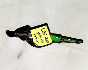 The ReAnimator Movie enamel pin, approximately 1 inch long