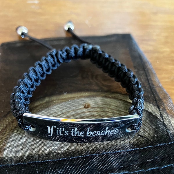 Avett Brothers song “If It's the Beaches" is a big favorite. The bracelet is adjustable, with black or silver engraved plates