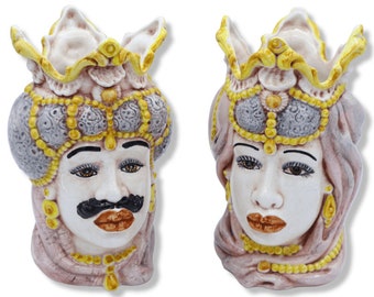Pair of dark brown heads in Caltagirone ceramic with crown and turban, h approx. 18 cm Mod BR