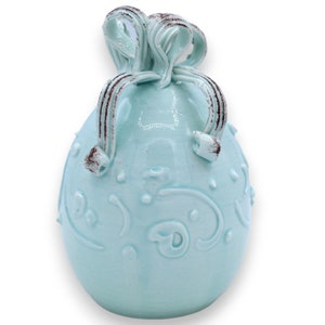 Aquamarine egg with ribbon in fine ceramic, h approx. 15 cm, baroque style decoration in relief