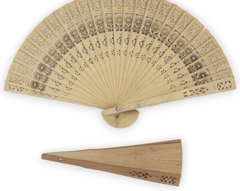 May include: A wooden folding fan with a floral design. The fan is closed and has a brown handle.