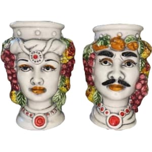 Pair of Moorish heads in Caltagirone ceramic, 10 cm high.