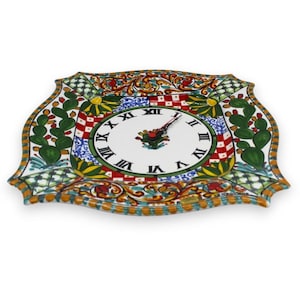 Caltagirone ceramic clock, ÈLITE series, approx. 38 cm high, complete with gear and Sicilian cart decoration.