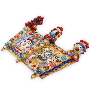 Sicilian cart side in fine ceramic, with applications and decorations of a woman and a paladin, h 19 and w 24 cm approx.