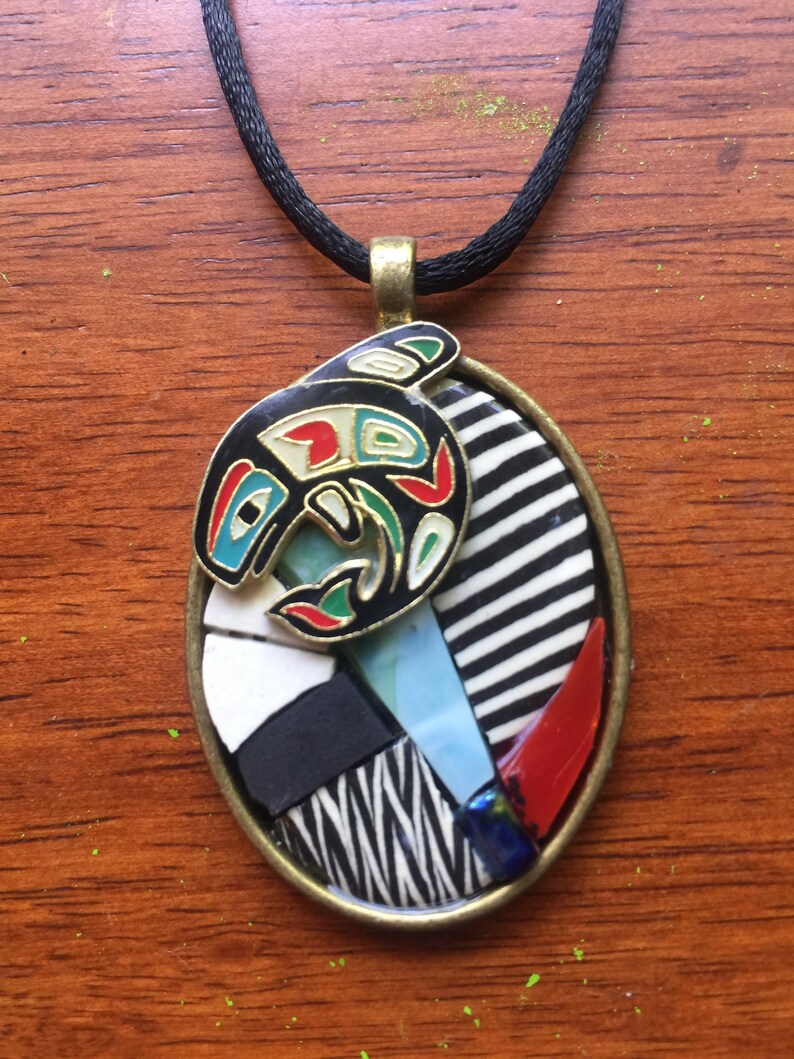 Oval Northwest coast with whale