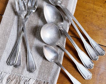 Cubiertos antiguos de plata bañada de la compañía ferroviaria New York Central.