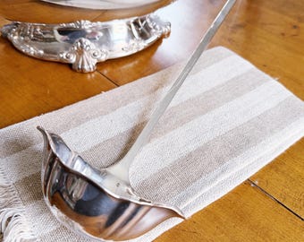 Cucharón antiguo bañado en plata del Hotel Willard en Washington D.C.