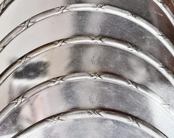 Set mit 6 versilberten Platztellern vom Placa Athenee Hotel in Paris