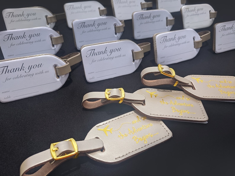 BULK RECEPTION WEDDING luggage tags Champagne leather, and so the Adventure Begins in gold, our quote 23, ld buckle. image 1