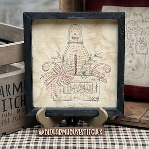 The Christmas Box Primitive Stitchery Framed Print