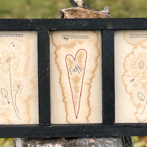 Love Blooms Primitive Stitchery Framed Print