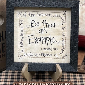 Be Thou an Example Primitive Stitchery Framed Print