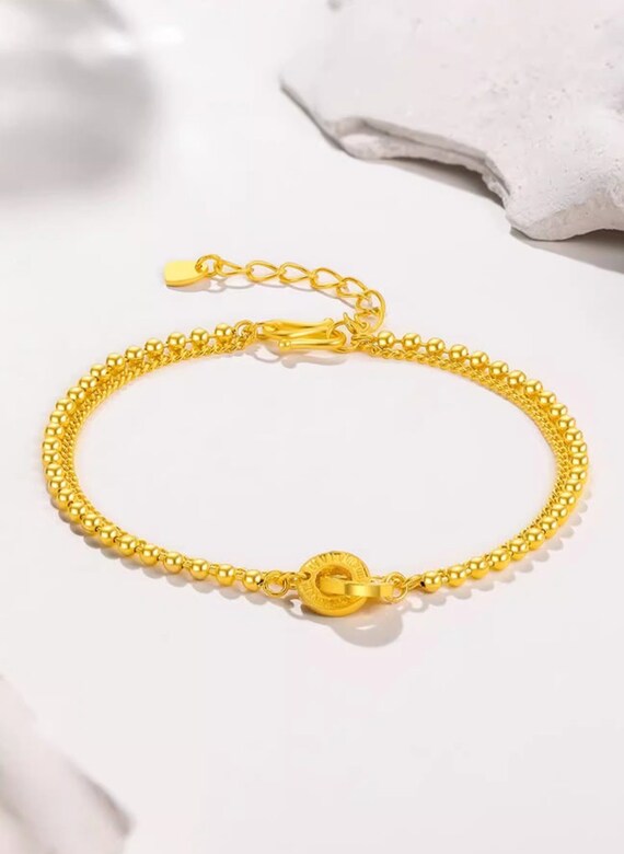 UMQ 24k Gold Dragon and Phoenix Charm gold bracelets for
