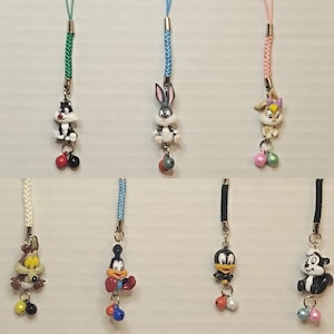 Colección encadenable de Baby Looney Tunes, conjunto completo de 9 artículos geniales, juguetes para máquinas expendedoras, minifiguras, llaveros con dijes de dibujos animados de Warner Bros.