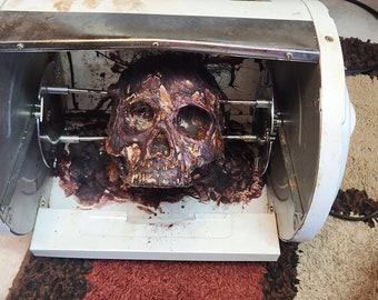 Rotating skull Handmade by me. Looks like it is cooking