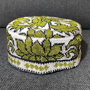 May include: A set of three ceramic mugs with a speckled, matte finish. The mugs are in shades of cream, light gray, and dark gray. Each mug has a simple, minimalist design, perfect for coffee or tea.