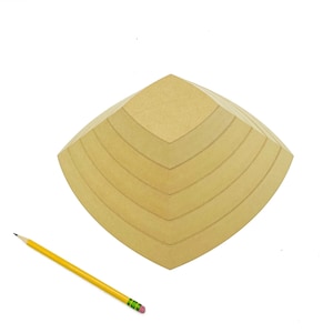 May include: A set of seven wooden nesting bowls in a light brown color. The bowls are stacked in a pyramid shape, with the largest bowl at the bottom and the smallest bowl at the top.