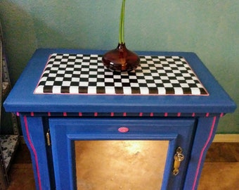 Hand painted, one of a kind bedside mirrored chest with a checkerboard top