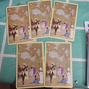 Cartas de jogar com pintura vintage à beira-mar