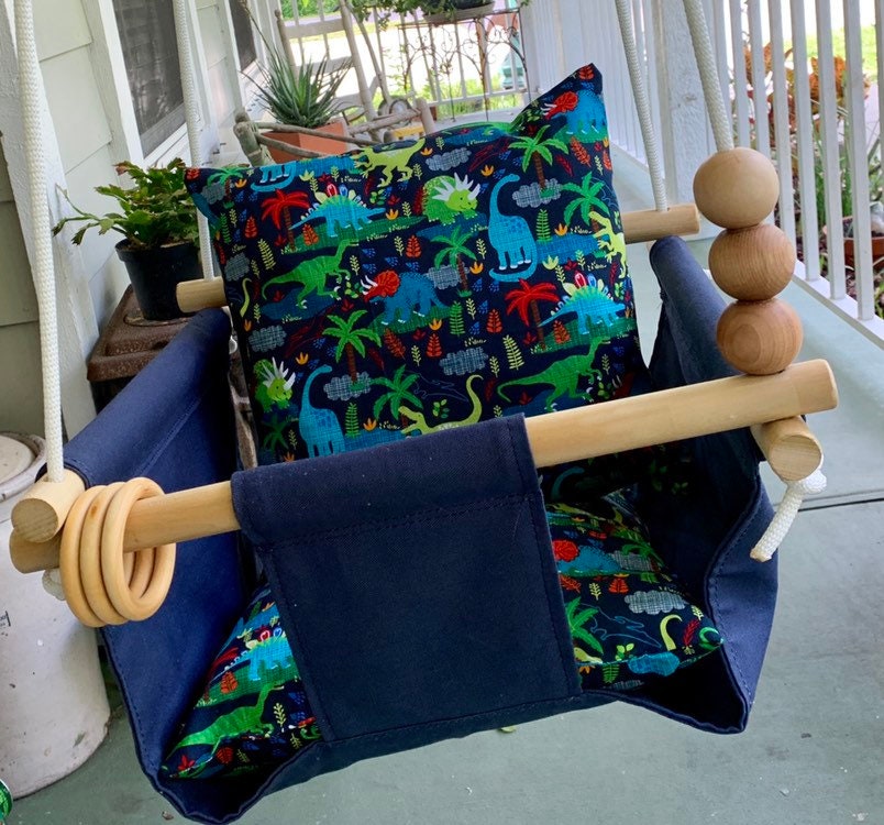 dinosaur baby swing