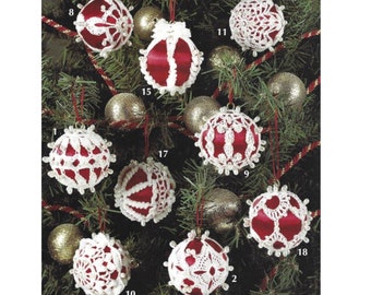 May include: Nine red and white crocheted Christmas ornaments with beaded trim. The ornaments are hanging on a green Christmas tree.