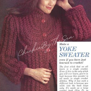 May include: A close-up of a woman wearing a red crocheted yoke sweater. The text "Make a YOKE SWEATER even if you have just learned to crochet!" is printed below the image.