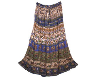 May include: A long, flowing skirt with a vibrant, patterned design. The skirt features bands of blue, brown, and green with floral and elephant motifs. The skirt has a drawstring waist and a full, flared silhouette.