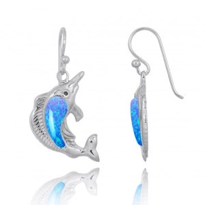 May include: Sterling silver dangle earrings featuring a blue opal marlin design. The earrings have a hook closure.