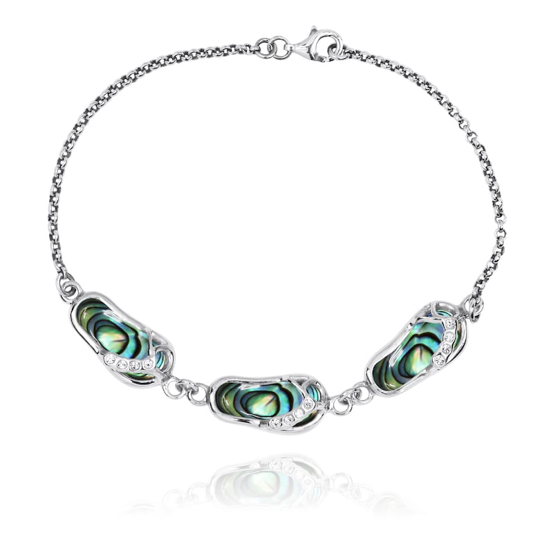 May include: A silver chain bracelet with three abalone shell charms. Each charm is shaped like a flip-flop and has small clear crystals.
