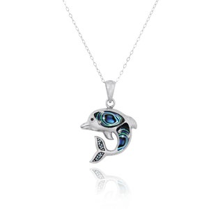 May include: A silver necklace with a dolphin pendant. The dolphin is made of abalone shell and has a blue and green iridescent color. The dolphin's tail is accented with small clear stones.
