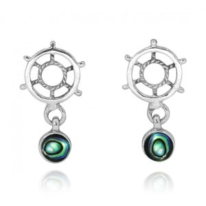 May include: Silver earrings with a ship's wheel design and a dangling abalone shell charm.