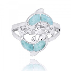 May include: Sterling silver ring featuring two intertwined dolphins with blue and green gemstone accents and a small clear diamond.