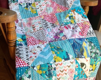 Memory Quilt: Handmade Keepsake from Baby Clothes