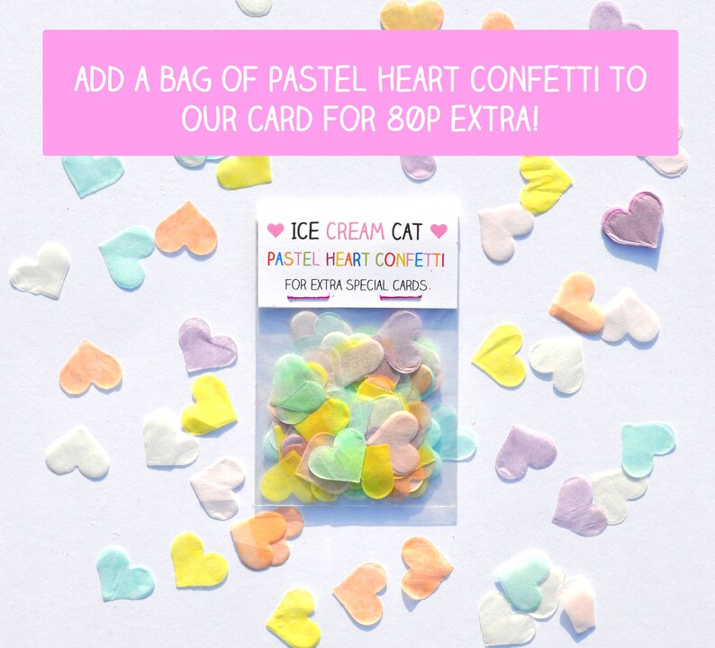 May include: A bag of pastel heart confetti for adding to cards. The bag is labeled "ICE CREAM CAT PASTEL HEART CONFETTI FOR EXTRA SPECIAL CARDS."