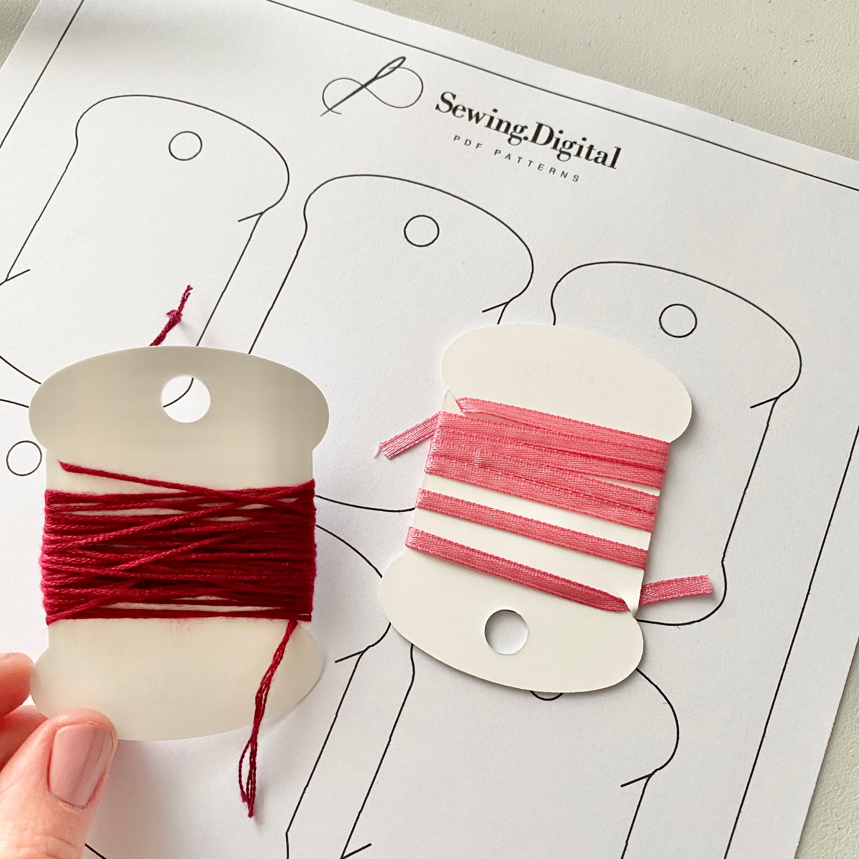Printable DIY Box for Sewing Bobbins. Graphic by artsbynaty
