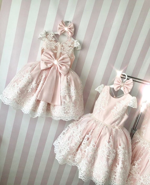 white and light pink dress