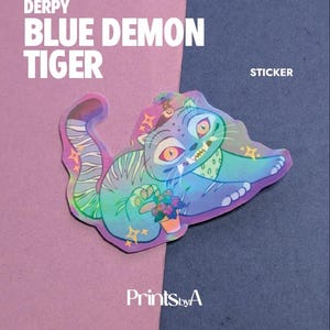 May include: A holographic sticker featuring a blue tiger with orange eyes, a small toothy grin, and a spotted neck scarf, holding a small potted plant. The sticker includes yellow star accents and the text DERPY BLUE DEMON TIGER STICKER.