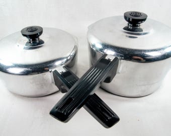 Magnalite saucepans with lids; GHC heavy-guage 2-1/2 and 3 qt saucepans
