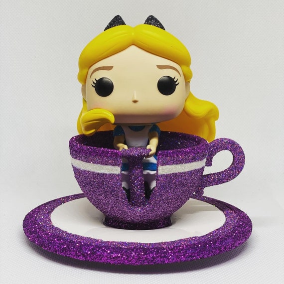 Buy Pop! Alice with Tea at Funko.