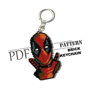 May include: A PDF pattern for a beaded Deadpool keychain. The pattern is for a brick stitch design and features a red and black Deadpool character with a white mask.