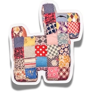 May include: A patchwork dog toy made from colorful fabric scraps. The toy is shaped like a dog and has a variety of patterns, including floral, plaid, and polka dots.