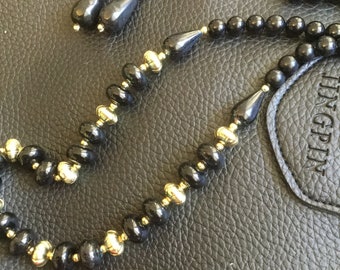 Black and gold toned plastic 80’s vintage earrings and necklace set