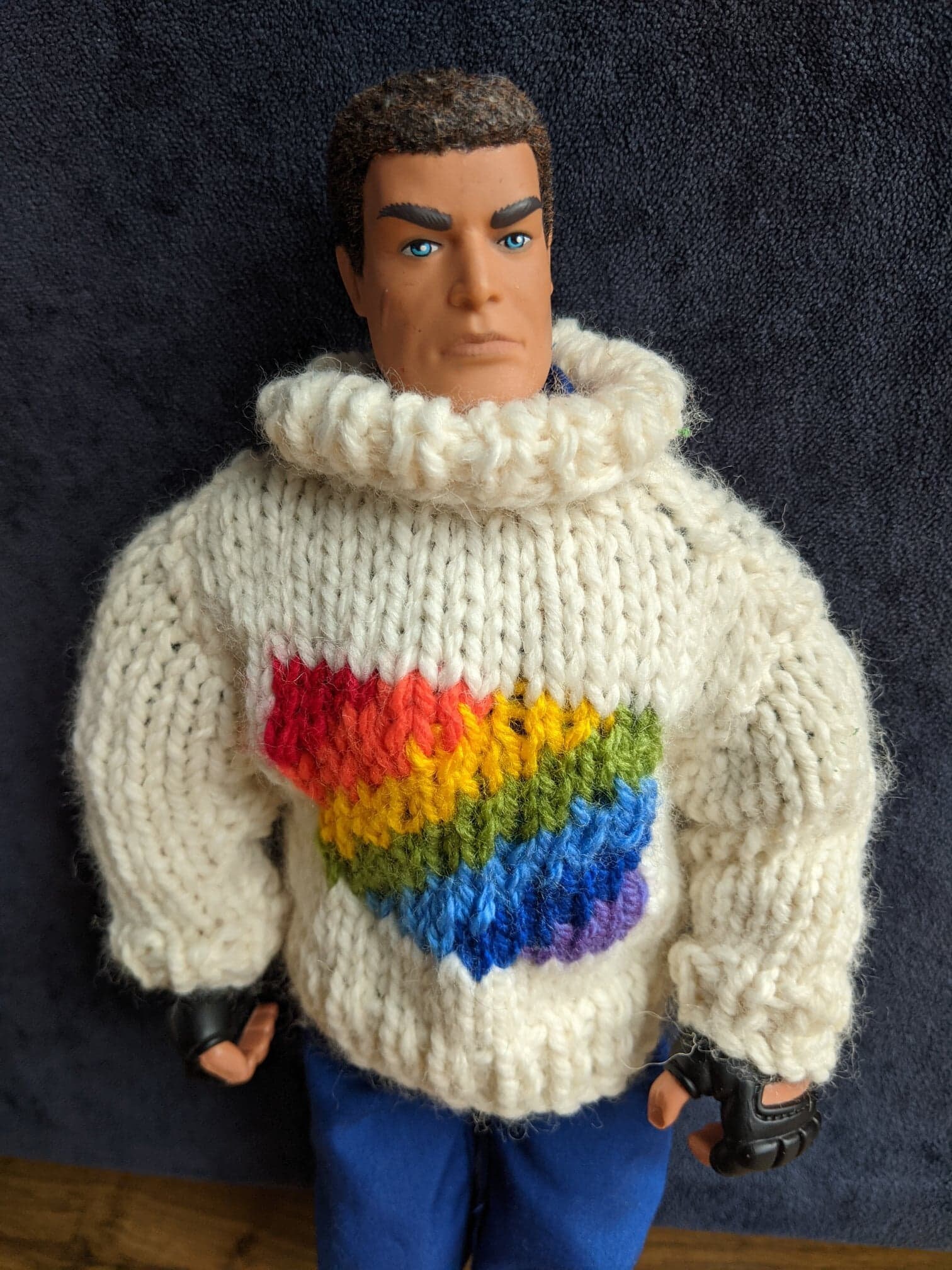 Vintage Action man in hand knitted rainbow jumper. Includes Etsy