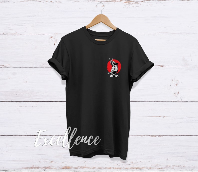 May include: Black t-shirt with a white graphic of a samurai warrior standing in front of a red sun.