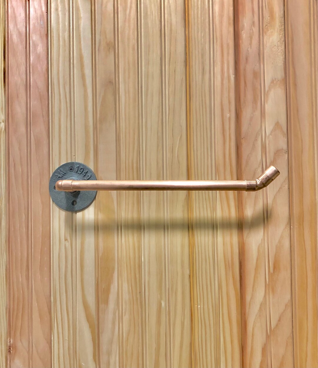 Copper Pipe Wall Mounted Paper Towel Holder. This Photo is a Right Side