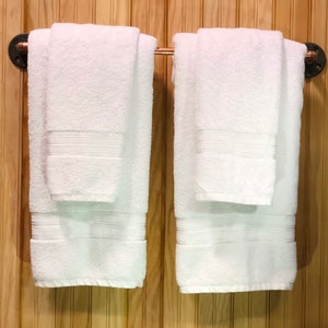 Rustic copper pipe single bar towel rack.