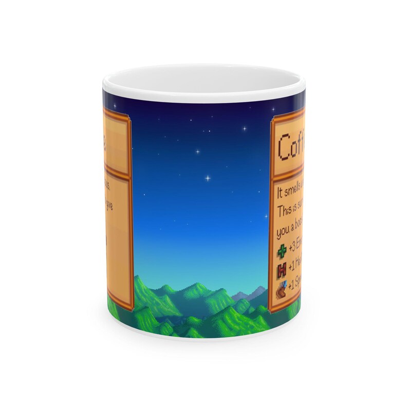 May include: A white ceramic mug with a Stardew Valley inspired design. The mug features a night sky with stars and a mountain range in the foreground. The text "Coffee" is displayed in a yellow box with a brown border. The text "It smells like..." is displayed in a white box with a brown border. The text "This is a super..." is displayed in a white box with a brown border. The text "you a boost..." is displayed in a white box with a brown border. The text "+3 Energy" is displayed in a white box with a brown border. The text "+1 Health" is displayed in a white box with a brown border. The text "+1 Speed" is displayed in a white box with a brown border.